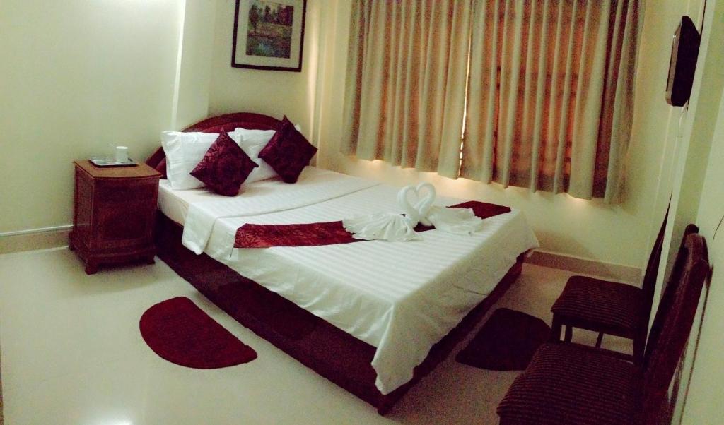 Homeland Guesthouse Phnom Penh Zimmer foto