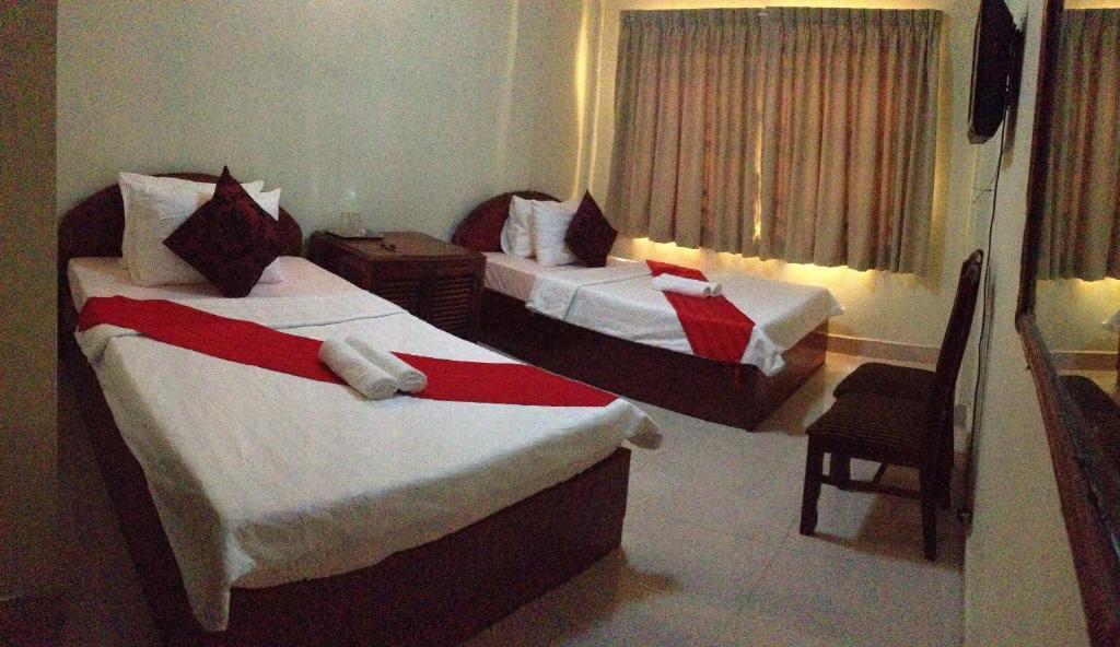 Homeland Guesthouse Phnom Penh Zimmer foto