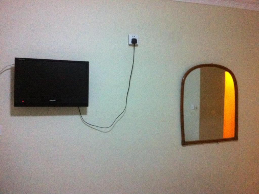 Homeland Guesthouse Phnom Penh Zimmer foto